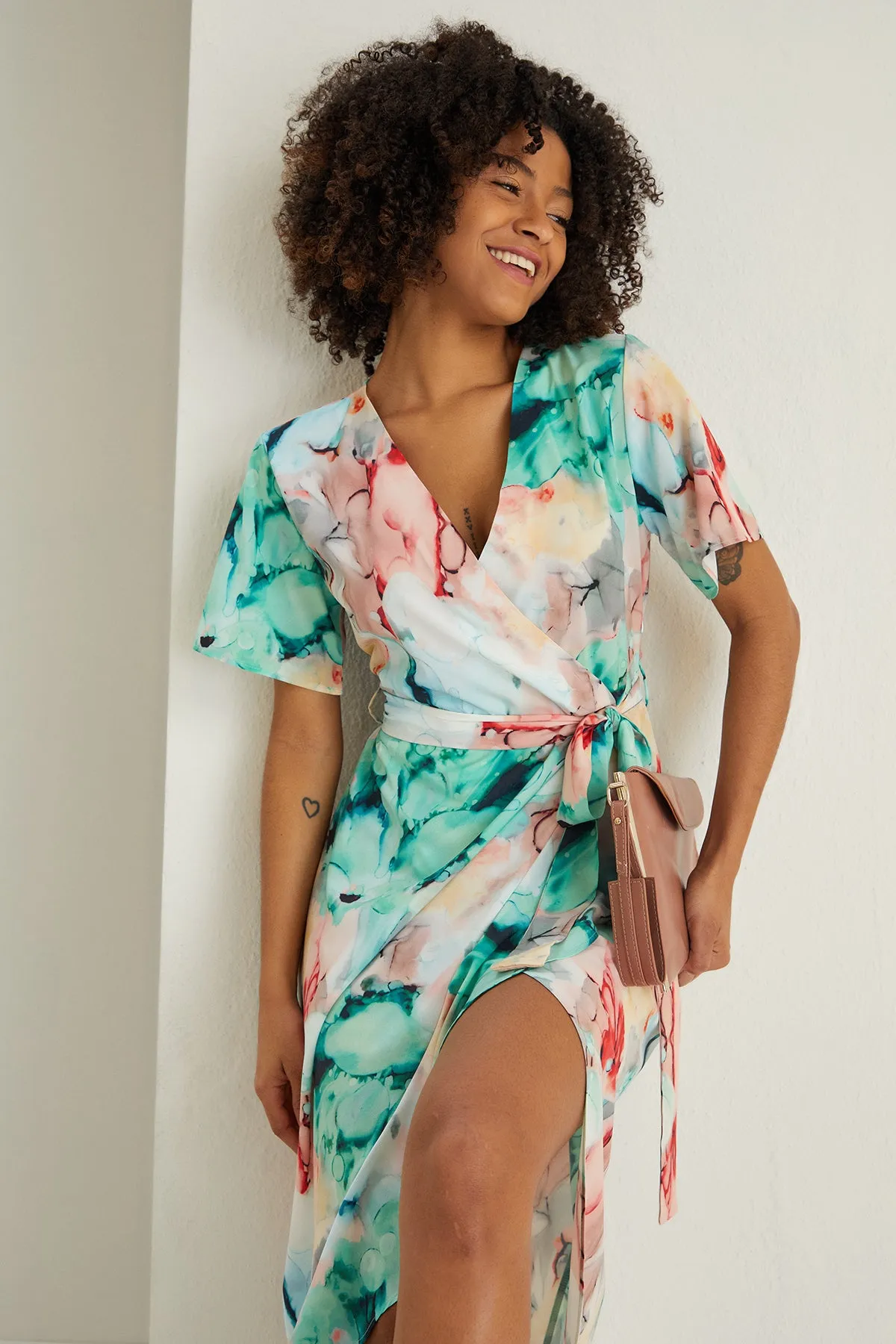 Ruffle hem Wrap Midi Dress in Green Floral print