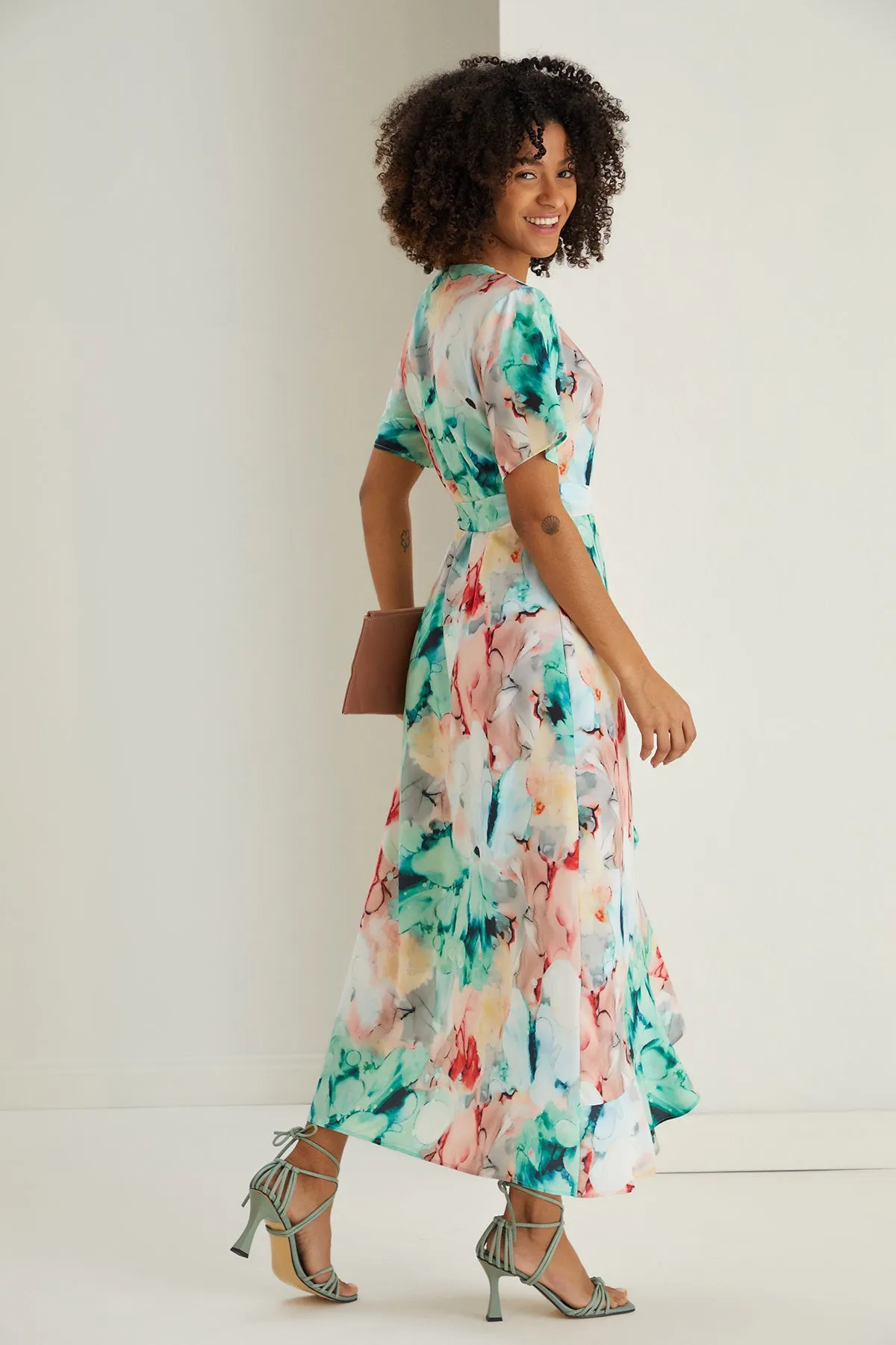 Ruffle hem Wrap Midi Dress in Green Floral print